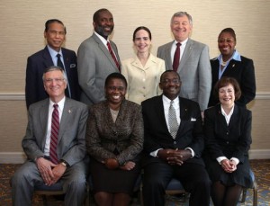 The Judicial Council for the 2012-16 Quadrennium pose for a group photo during the 2012 United Methodist General Conference in Tampa, Fla. Seated, from left: Belton Joyner, J. Kabamba Kiboko, N. Oswald Tweh Sr., and Kathi Austin Mahle. Standing from left: Ruben T. Reyes, Dennis Blackwell, Beth Capen, William B. Lawrence and Angela Brown. A UMNS photo by Kathleen Barry.